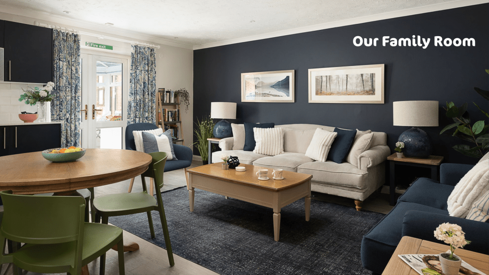 Comfortable living room space with sofas and dining table